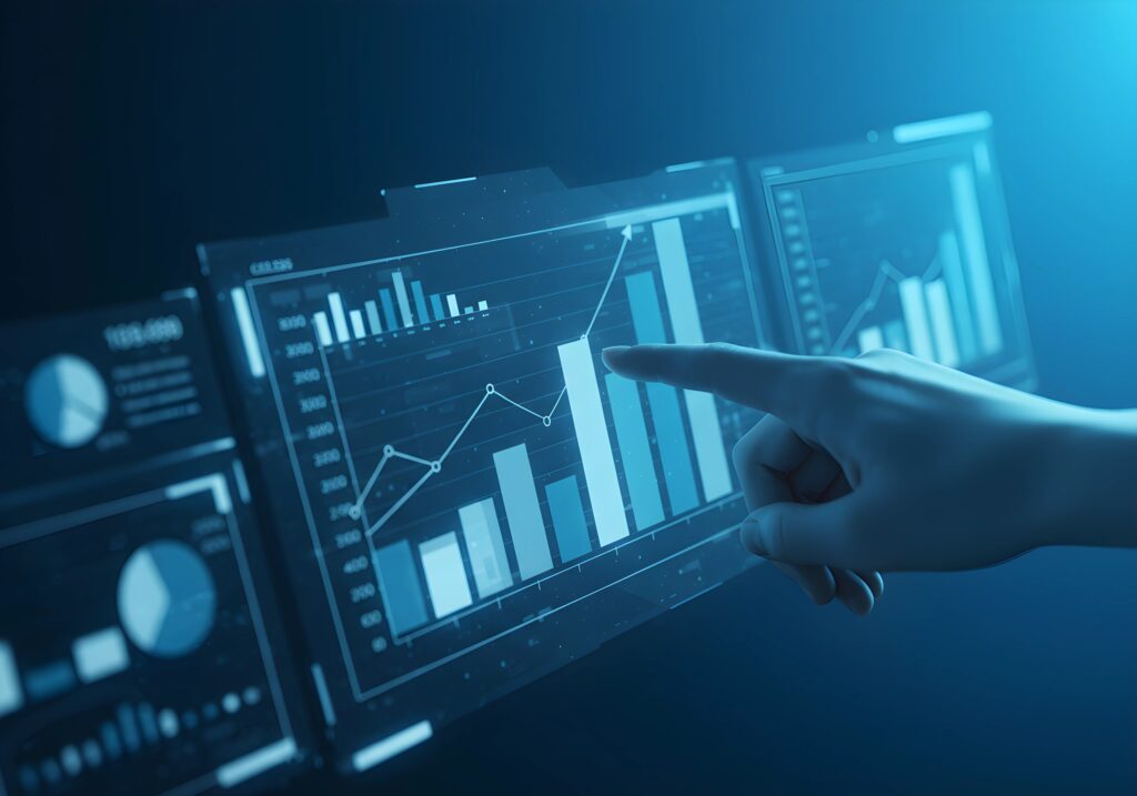 financial data charts analysis hand pointing at bar